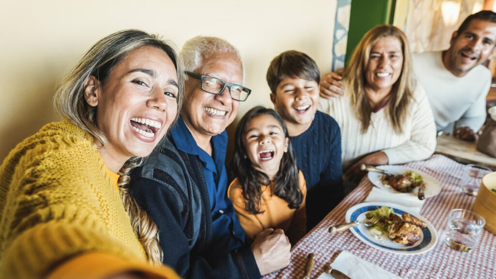 Happy family sharing dinner